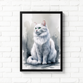 Watercolor white cat portrait in a black frame on a white brick wall
